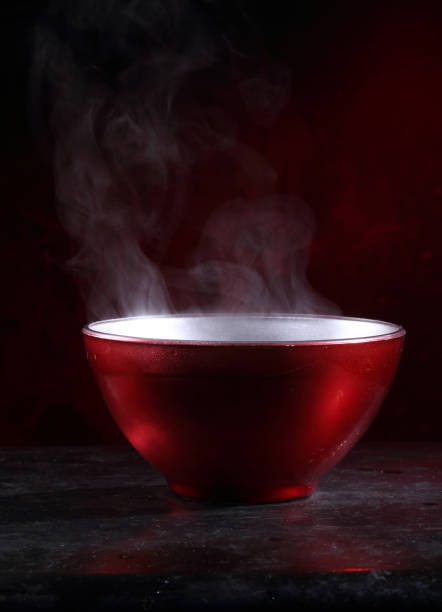 istock Chinese noodles with red pepper on black background 1309859756