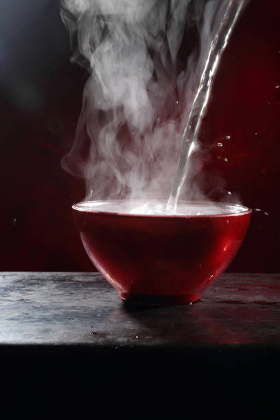 istock Chinese noodles with red pepper on black background 1309860268