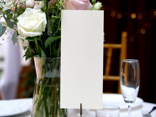 istock Mockup white blank space card, for Menu, Flyer, greeting, invitation on wedding table background. with clipping path 1309862065
