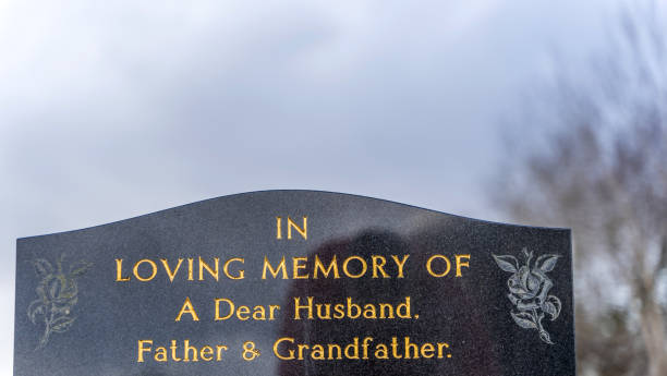istock Gravestone for father husband and grandfather 1309865692