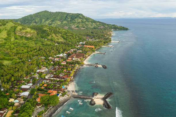 Aerial view of the Candidasa town and beach in eastern Bali in Indonesia. This is a popular beach resort. stock photo