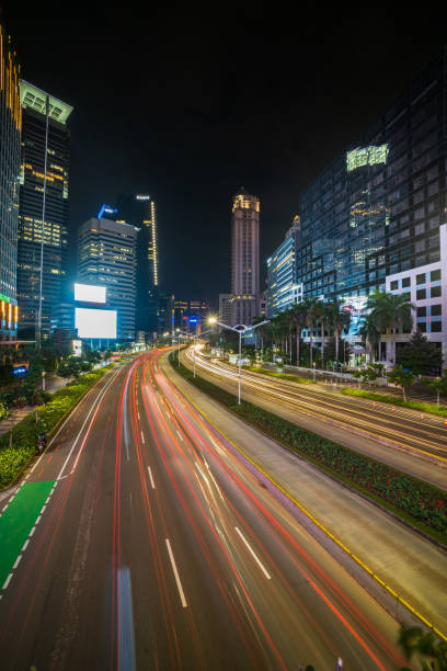 istock Traffic at night on Jalan Sudirman , Jakarta 1309865901