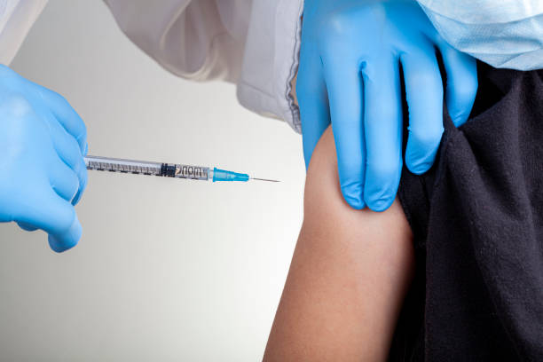 concept image for children getting  vaccination - deltoid imagens e fotografias de stock