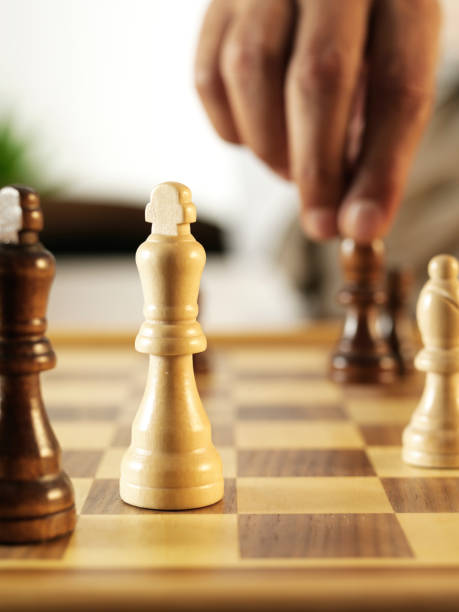 istock Business Man Playing Chess 1309871694