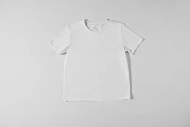 istock White baby T-shirt on grey background 1309872644