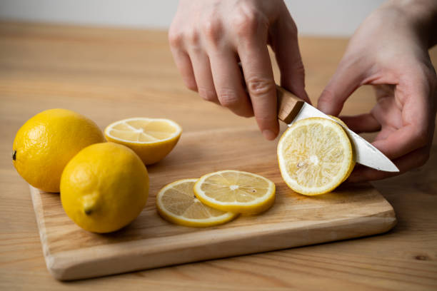 istock Lemon slices on the old wooden table 1309874348