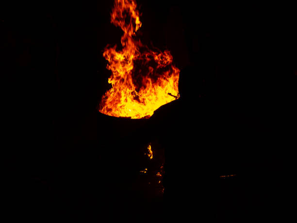 istock Bright flames in the darkness 1309875311
