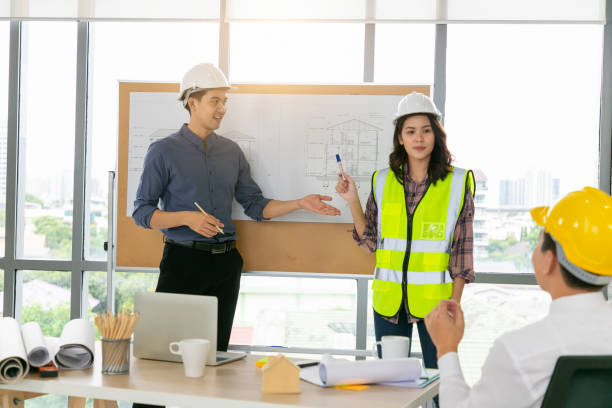 istock Group of diversity people engineer meeting or discussing work in office or construction. Engineering business concept. 1309878931
