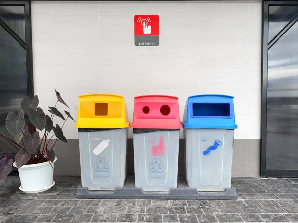 istock Trash in garbage cans with sorted garbage. Recycling garbage separation collection and recycled in the park 1309880058
