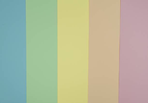 istock Colorful pastel paper sheets background 1309881460
