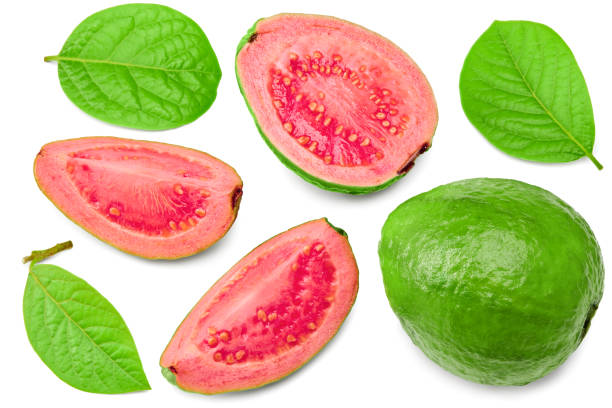 guava with slice isolated on white background. clipping path. top view guava with slice isolated on white background. clipping path. top view guava photos stock pictures, royalty-free photos & images