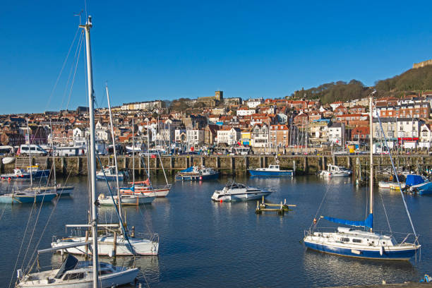 istock Harbor seafront town with pleasure craft marina 1309884060