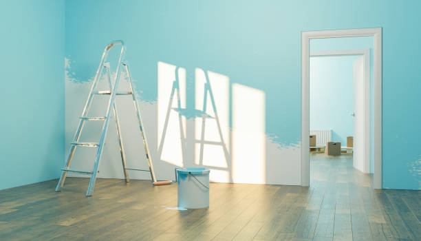 istock interior of a new house with paint can and half painted wall 1309886213