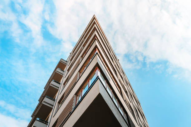 istock Residential or business modern building with blue sky 1309886614