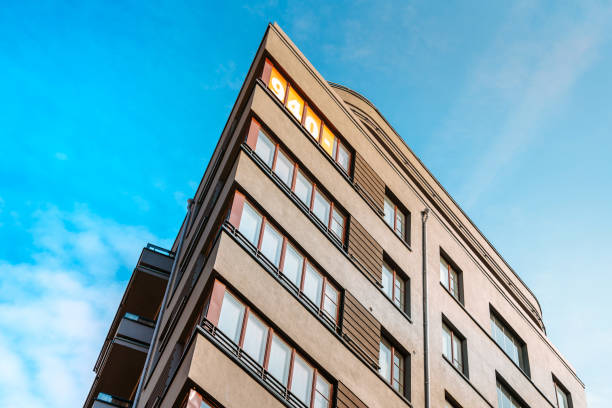 istock Residential or business modern building with blue sky 1309887305