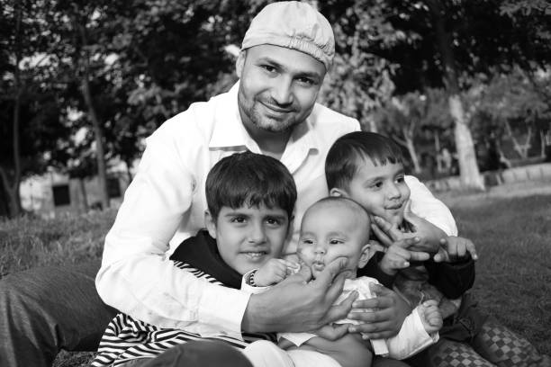istock Family portrait in park 1309888779