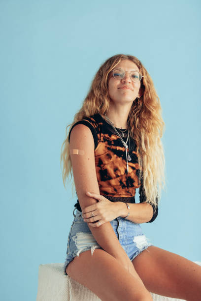 istock Woman feeling proud after getting vaccine 1309890392