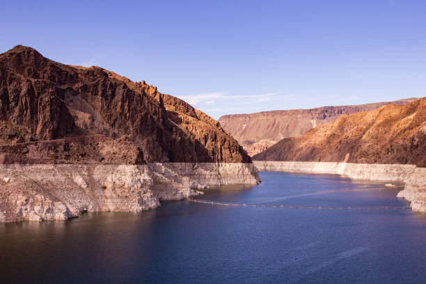 istock Structures and bridges by the lake in the desert 1309890587