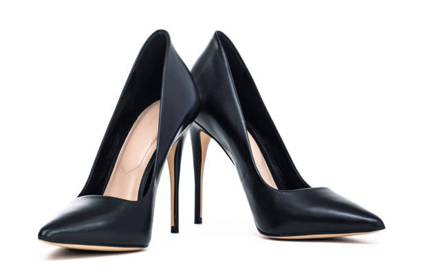 istock Black female high heel shoes isolated on white 1309893180