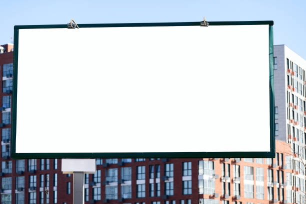 istock Blank empty billboard against new modern residential buildings 1309893228