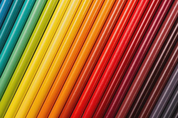 istock Beautiful color pencils on the blue background. 1309894592