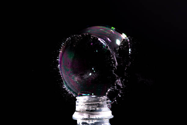 istock Catching a bubble popping with high-speed photography 1309898094