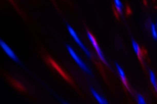 istock colorful neon light leaks on black background 1309901417