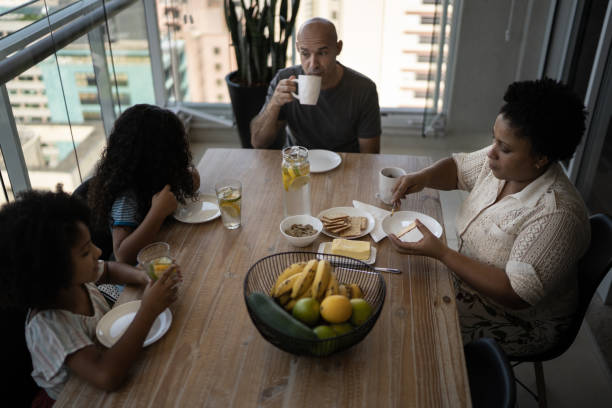 istock Family having breakfast at home 1309901729