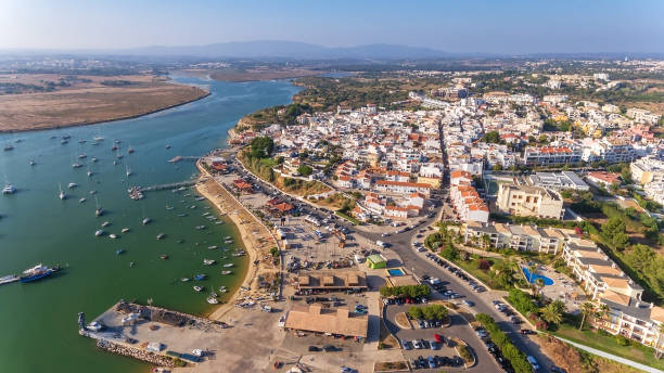 Aerial view of the village of Alvor, in the summer, in southern Portugal. Aerial view of the village of Alvor, in the summer, in southern Portugal. High quality photo alvor stock pictures, royalty-free photos & images