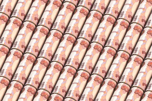 Background from rolled up ruble bills. Creative money pattern. The banknotes are arranged diagonally. 3d illustration.