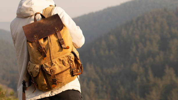 Free Stock Photo of A pair of backpacks on a rock | Download Free ...