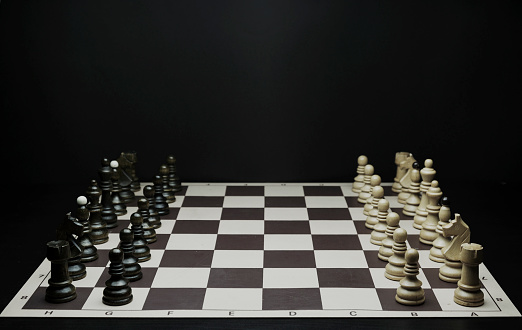 Black pawns and golden King