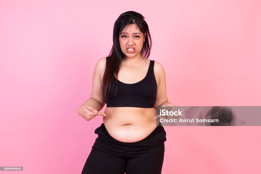 그녀의 배를 가리키는 뚱뚱한 여자 분홍색 배경에 서 행복 과체중 여자 뚱뚱한 뚱뚱한 여자 플러스 크기 패션 모델 핑크 배경에 뚱뚱한 여자  아시아인에 대한 스톡 사진 및 기타 이미지 - iStock 그녀의 배를 가리키는 뚱뚱한 여자 분홍색 배경에 서 행복 과체중 여자 뚱뚱한 뚱뚱한 여자 플러스 크기 패션 모델 핑크 배경에 뚱뚱한 여자  아시아인에 대한 스톡 사진 및 기타 이미지 - Istock