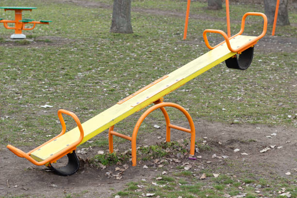 istock empty baby swing in the playground 1309909299