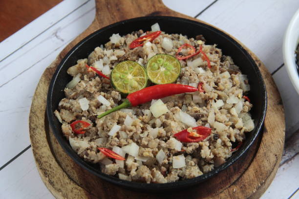 istock reshly cooked Filipino food called Pork Sisig 1309910657