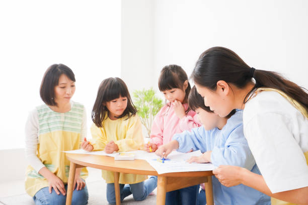 istock Children drawing at the nursery school 1309914514
