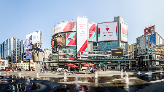 Toronto / Canada - 05/16/2018: Panorama of Yonge-Dundas square, downtown Toronto