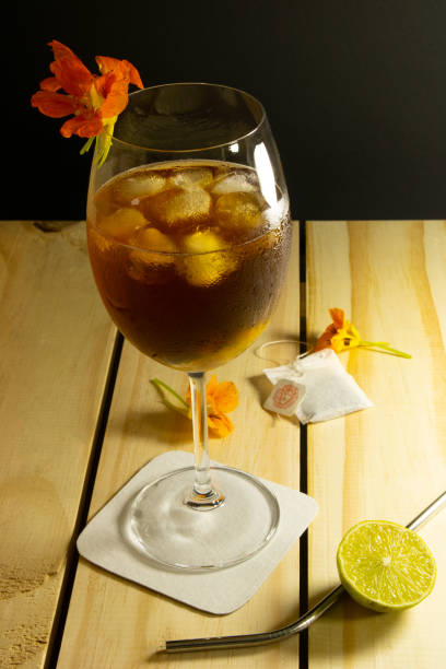 istock Fresh Lemon Ice tea drink in a dark background 1309915689