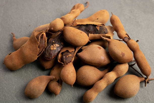 istock Fresh Tamarind fruits 1309915772