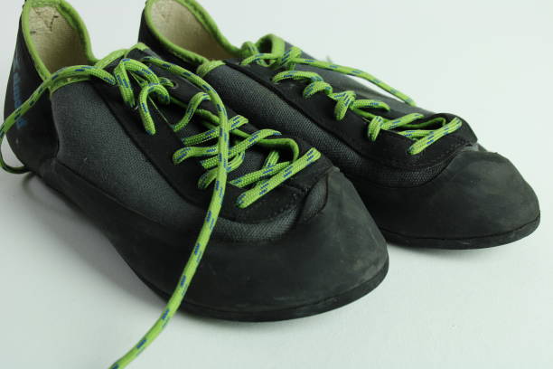 istock Green and Black Rock Climbing Shoes 1309916336