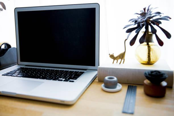 istock Snapshots around laptop and workspace table 1309917864