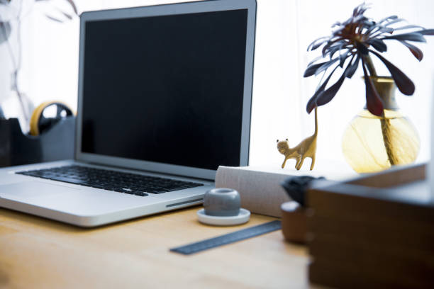 istock Snapshots around laptop and workspace table 1309917890