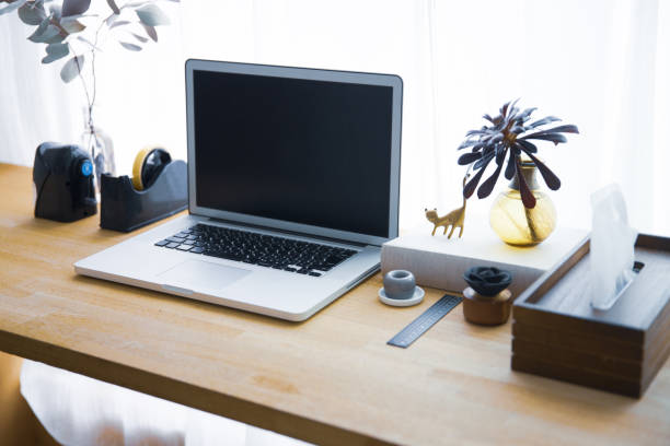 istock Snapshots around laptop and workspace table 1309917920