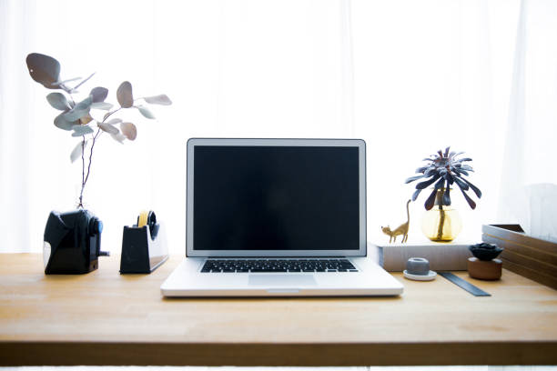 istock Snapshots around laptop and workspace table 1309917936