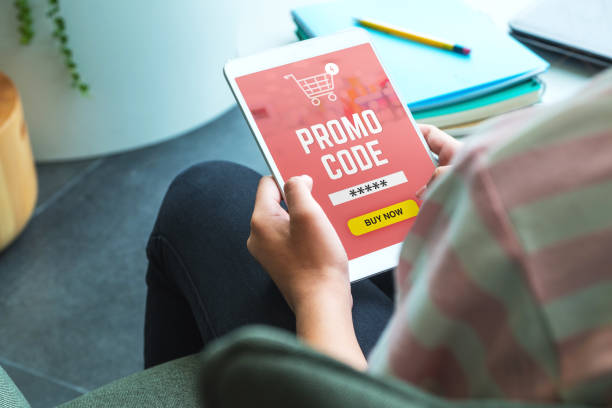 shopping online with tablet app and use promo code payment when order online at home.digital new normal lifestyle.close up woman use mobile buy online store