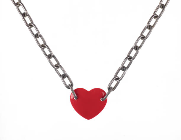 istock red heart chained on a chain isolated on white background 1309924977