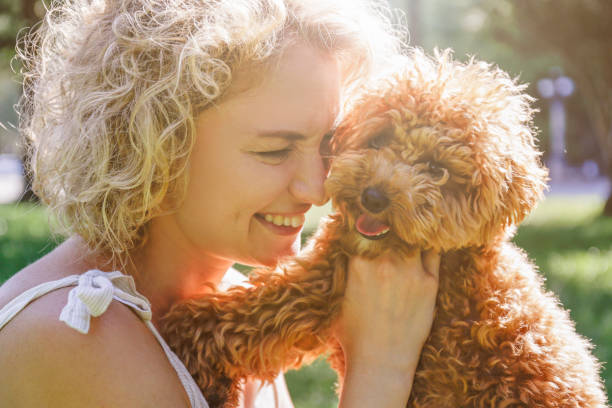 istock Happy woman with her dog 1309925517
