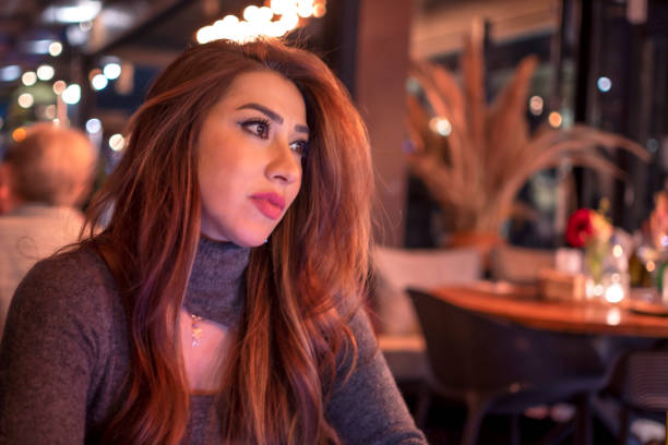 istock Young woman relaxation to restaurant 1309927098