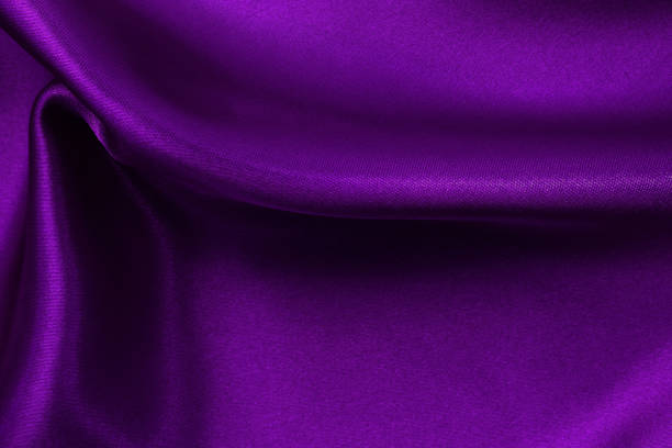 istock Purple fabric cloth texture for background and design art work, beautiful crumpled pattern of silk or linen. 1309928168