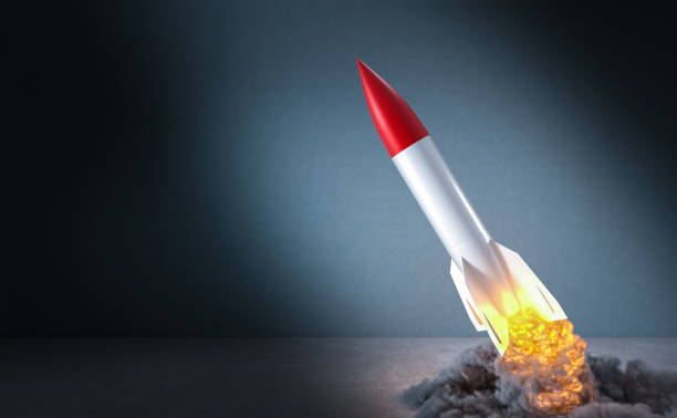 istock missile starting with flames and smoke. 1309928412